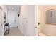 Bright entryway features neutral walls and tile flooring, leading to the home's interior at 3550 Mayfair St, Kissimmee, FL 34758