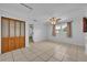 Bedroom with tile floor, ceiling fan, and large closet at 397 Oslo Dr, Deltona, FL 32725