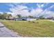Well-maintained single-Gathering home with a spacious front yard at 397 Oslo Dr, Deltona, FL 32725
