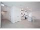 Bright, open-concept kitchen featuring white cabinets, granite countertops, and a center island at 4152 Sagefield Dr, Harmony, FL 34773