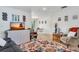 Comfortable living room showcasing the decor with an open view of the dining area at 4482 Se 142Nd St, Summerfield, FL 34491