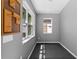 Bonus room with natural light and a pegboard wall at 475 Pitt St, Clermont, FL 34711
