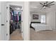 Main bedroom featuring a large closet, tray ceiling and ceiling fan at 475 Pitt St, Clermont, FL 34711