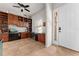 Home office with built-in shelving, desk space, and a bright window for natural light at 475 Pitt St, Clermont, FL 34711
