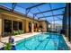 Backyard oasis featuring a sparkling pool and outdoor seating at 475 Pitt St, Clermont, FL 34711