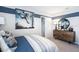 Bedroom features stylish decor, ample lighting and a decorative dresser at 4770 Cloister St, Kissimmee, FL 34758