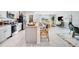 Modern kitchen featuring granite countertops, stainless steel appliances, and an open layout at 4770 Cloister St, Kissimmee, FL 34758