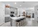 Modern kitchen featuring a large center island, stainless steel appliances, and open layout at 5052 Blanchard Ct, St Cloud, FL 34772