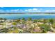 Desirable neighborhood with waterfront access, showcasing lush landscaping and well-kept homes at 5263 Jade Cir, Belle Isle, FL 32812