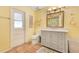 Bright bathroom featuring a vanity with storage, tile floors, and a shower at 5263 Jade Cir, Belle Isle, FL 32812