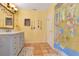 Bathroom featuring a large vanity with storage, tile floors, and a shower at 5263 Jade Cir, Belle Isle, FL 32812
