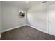 Bedroom with carpeting, and a window with a view at 5618 Carris Ct, Orlando, FL 32810