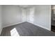 Cozy bedroom with neutral carpet, dual closets, and easy access to an ensuite bathroom at 5618 Carris Ct, Orlando, FL 32810