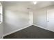 Bedroom with two doors and a large window at 5618 Carris Ct, Orlando, FL 32810