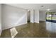 Spacious room with neutral walls and tile flooring, ready for your personal touch at 5618 Carris Ct, Orlando, FL 32810