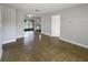 Bright and airy living space leading to the backyard and kitchen, perfect for entertaining at 5618 Carris Ct, Orlando, FL 32810