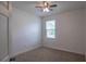 Cozy bedroom with carpet flooring, natural light, and neutral decor at 5694 Aragon Ave, De Leon Springs, FL 32130
