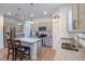 Modern kitchen featuring granite countertops, stainless steel appliances, and breakfast bar seating at 5694 Aragon Ave, De Leon Springs, FL 32130