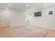 Bright living room with recessed lighting, wood floors and a decorative rug at 6525 Rover Way, St Cloud, FL 34771