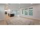 Bright living space connects kitchen and features large windows with backyard view at 6525 Rover Way, St Cloud, FL 34771