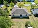 Aerial view of the house, showcasing the roof and backyard space at 7 Sequoia Way, Kissimmee, FL 34758