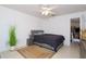 Bright bedroom with neutral decor and natural light at 7 Sequoia Way, Kissimmee, FL 34758