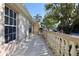 Home's front porch offers a quaint outdoor space at 7 Sequoia Way, Kissimmee, FL 34758