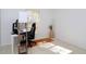 Office space with natural light; features neutral paint and tile floors at 7 Sequoia Way, Kissimmee, FL 34758