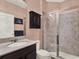 Bathroom with shower stall and built in cabinet at 7945 Pleasant Pine Cir, Winter Park, FL 32792