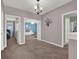 Hallway with carpet and view to bedrooms at 7945 Pleasant Pine Cir, Winter Park, FL 32792