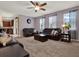 Living room with plush carpet and large windows at 7945 Pleasant Pine Cir, Winter Park, FL 32792