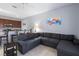 Open-concept living area with breakfast bar, perfect for casual dining and relaxation at 8963 Majesty Palm Rd, Kissimmee, FL 34747