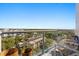 Balcony features seating and city views, creating a relaxing outdoor space to enjoy the surrounding scenery at 101 S Eola Dr # 902, Orlando, FL 32801