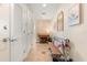 Inviting hallway features neutral tones, charming decor, and functional furniture, creating a warm and welcoming atmosphere at 101 S Eola Dr # 902, Orlando, FL 32801