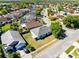 Aerial view of neighborhood highlighting a home with well-manicured lawn and a peaceful residential atmosphere at 14230 Sunriver Ave, Orlando, FL 32828