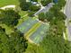 Aerial view of basketball courts located in the community park, offering recreation for residents at 14230 Sunriver Ave, Orlando, FL 32828