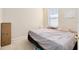 A standard bedroom with neutral walls and carpet at 14230 Sunriver Ave, Orlando, FL 32828