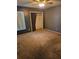 Bedroom with a ceiling fan and carpet at 1510 Massa St, Kissimmee, FL 34744