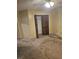Bedroom featuring a ceiling fan and dirty floor at 1510 Massa St, Kissimmee, FL 34744