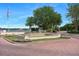 Beautiful fountain with flowers and decorative elements near the waterfront at 1563 Common Way Rd, Orlando, FL 32814