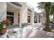 Picturesque town center featuring shops, restaurants, and brick sidewalks lined with palm trees at 1563 Common Way Rd, Orlando, FL 32814
