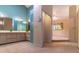 Well-lit bathroom features dual sinks, vanity, and modern fixtures at 160 Archers Pt., Longwood, FL 32779