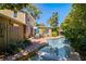 The backyard features a pool, patio area, and lush landscaping, perfect for outdoor entertaining and relaxation at 1621 Chippewa Trl, Maitland, FL 32751