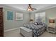 Comfortable bedroom featuring neutral walls, ceiling fan, and great natural light at 1621 Chippewa Trl, Maitland, FL 32751