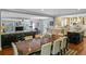 A lovely dining area adjacent to the kitchen with beautiful hardwood floors at 1621 Chippewa Trl, Maitland, FL 32751