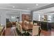 A lovely dining area adjacent to the kitchen with beautiful hardwood floors at 1621 Chippewa Trl, Maitland, FL 32751