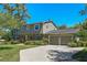 Charming two-story home with a well-manicured lawn, mature trees, and a two-car garage at 1621 Chippewa Trl, Maitland, FL 32751