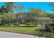 Charming two-story home with well-manicured lawn and mature trees for shade at 1621 Chippewa Trl, Maitland, FL 32751