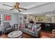 Comfortable living room with a modern leather sofa and hardwood flooring at 1621 Chippewa Trl, Maitland, FL 32751