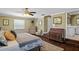 Cozy main bedroom with hardwood flooring, plenty of natural light and neutral paint at 1621 Chippewa Trl, Maitland, FL 32751